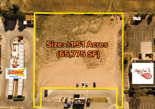 For Sale-3350 23rd Ave, Evans, CO - Aerial view of a Vacant Lot outlined in yellow, labeled as 1.51 acres (65,775 SF), bordered by Sonic Drive-In on the left and Swan Cakes on the right, with parking lots and roads nearby.