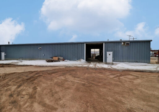 Commercial/Light Industrial For Sale-1100 Denver Ave, Ft Lupton, CO-Building 1 Side View Overhead Doors Open