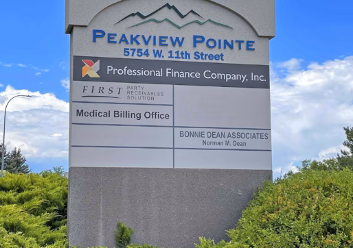 A large outdoor business sign for Peakview Pointe at 5754 W. 11th Street, Greeley, CO.