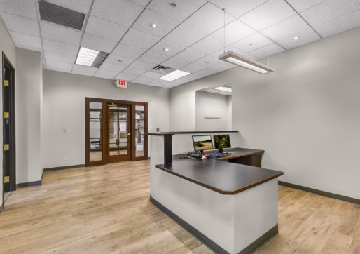 Suite 150 - Front Desk and Reception Area - View to Entrance to Suite