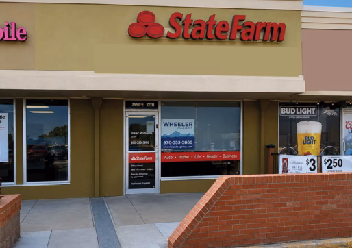 For Lease-2513 11th Ave, Greeley, CO 80631-A retail/office storefront in a shopping center with large windows, visible signs, and neighboring businesses including a phone store.